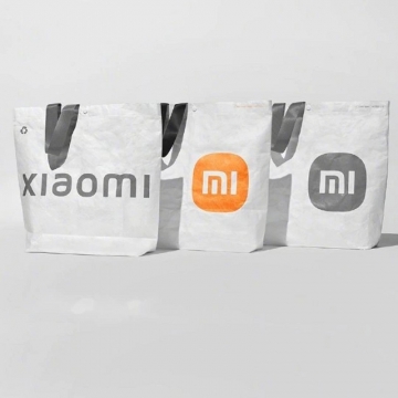 Эко-сумка Xiaomi Mi Eco Bag, модель: 33G10ZD2103H, материал Tyvek DuPont, высокая прочность на разрыв, высокая стойкость к многократным изгибам, водостойкость, химическая стойкость, термостойкость (сохраняет прочность и гибкость при – 75°, плавится при +135°), малый вес, стабильность размеров, застёжка-кнопка, две ручки, белая сумка с чёрными ручками и оранжевым логотипом или с серыми ручками и серым логотипом, фабричная упаковка, Киев