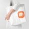 Эко-сумка Xiaomi Mi Eco Bag, модель: 33G10ZD2103H, материал Tyvek DuPont, высокая прочность на разрыв, высокая стойкость к многократным изгибам, водостойкость, химическая стойкость, термостойкость (сохраняет прочность и гибкость при – 75°, плавится при +135°), малый вес, стабильность размеров, застёжка-кнопка, две ручки, белая сумка с чёрными ручками и оранжевым логотипом или с серыми ручками и серым логотипом, фабричная упаковка, Киев